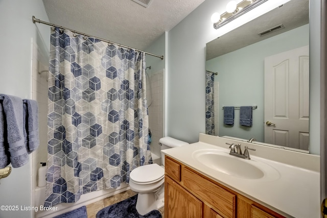 full bathroom featuring vanity, shower / tub combo, toilet, tile patterned floors, and a textured ceiling