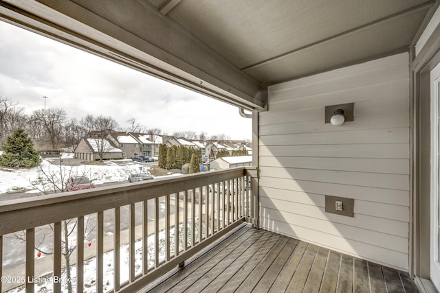 view of snow covered deck