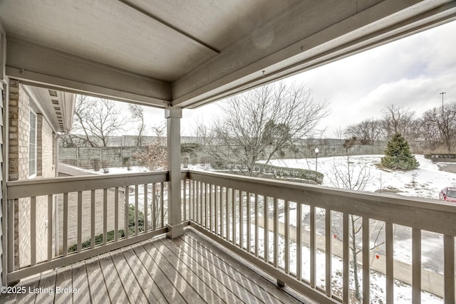 view of snow covered deck