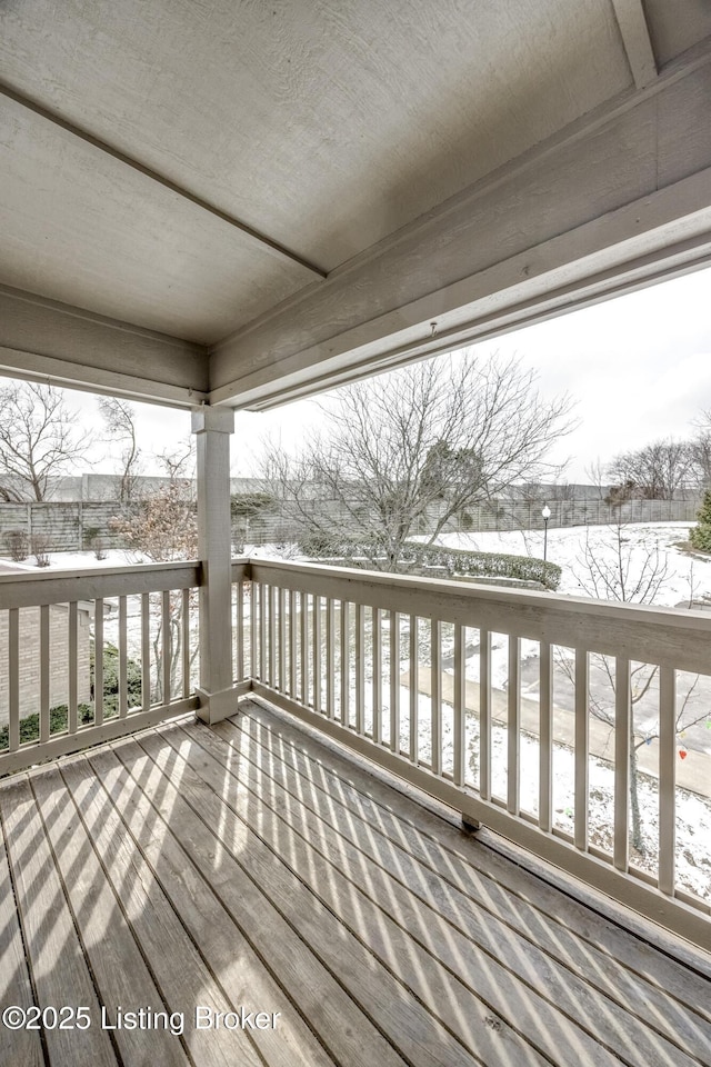 view of snow covered deck