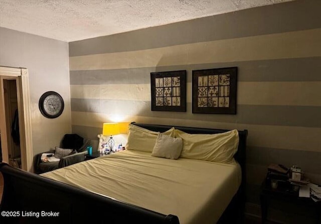 bedroom featuring a textured ceiling