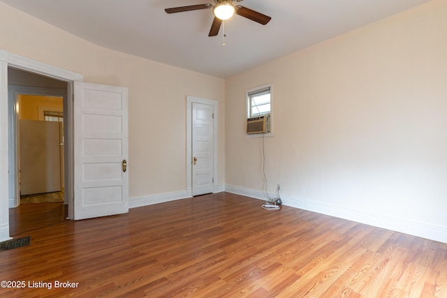 unfurnished room with light hardwood / wood-style flooring and ceiling fan