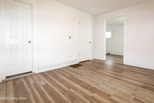 interior space with hardwood / wood-style flooring