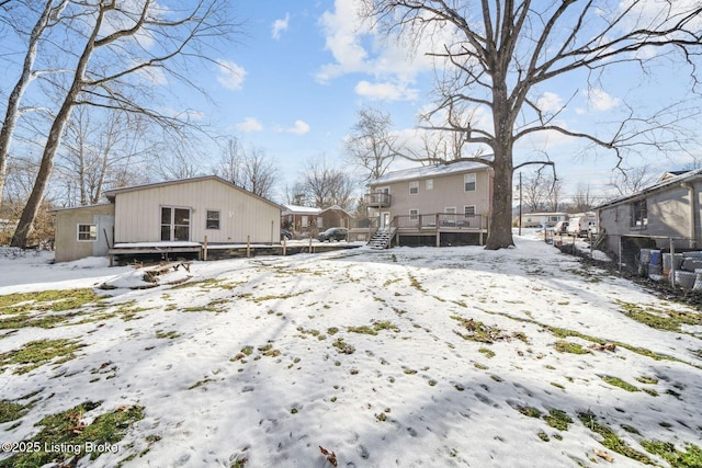 view of snow covered house