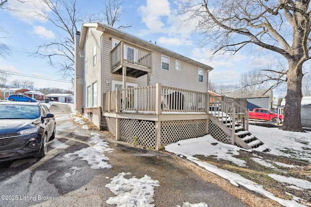 exterior space with a wooden deck