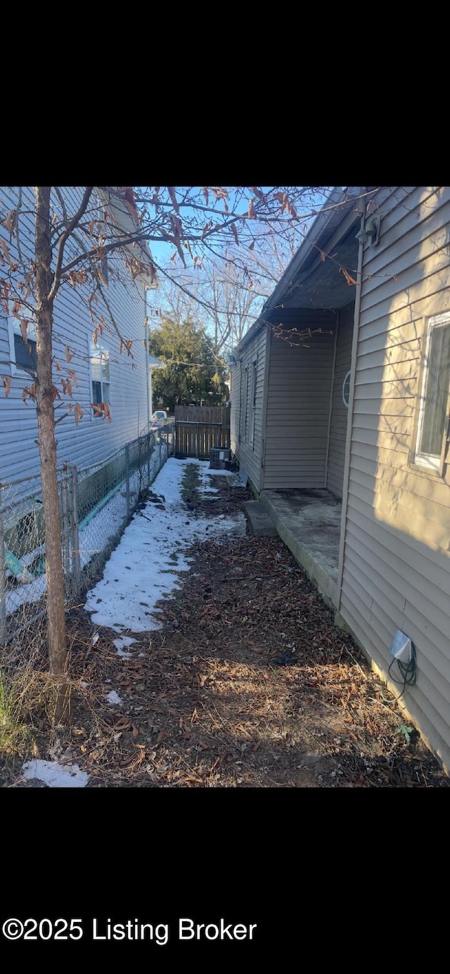 view of snow covered property