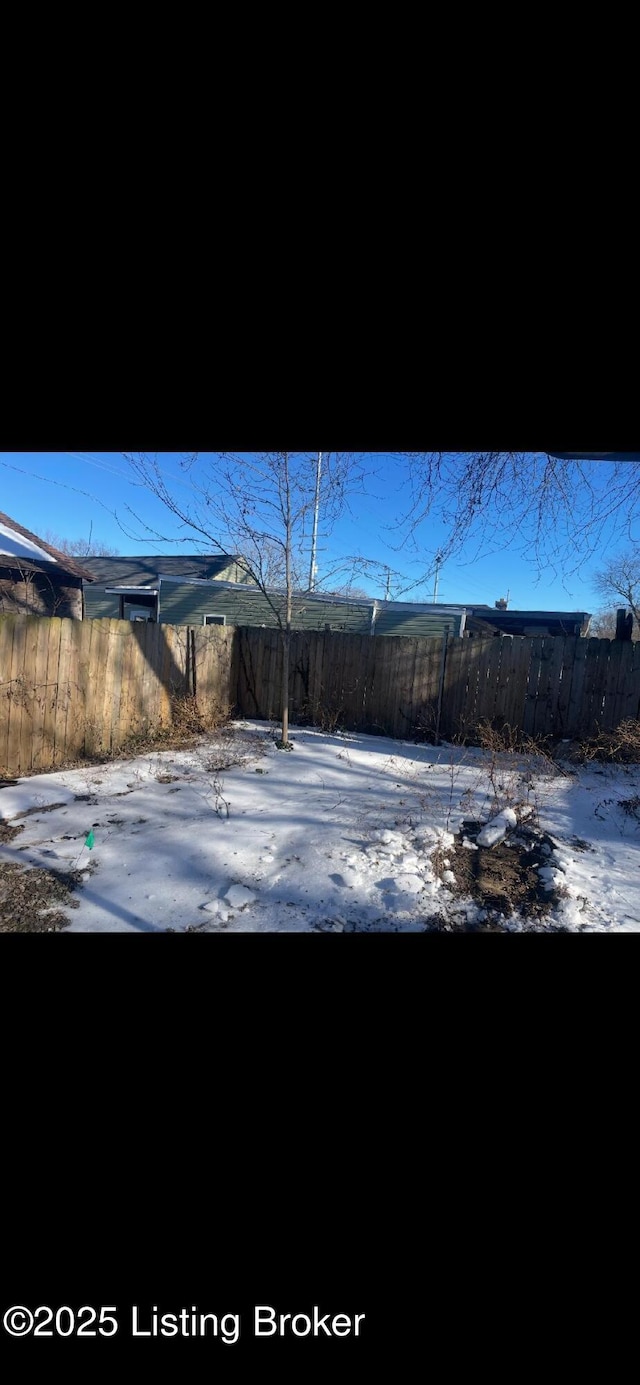 view of snowy yard