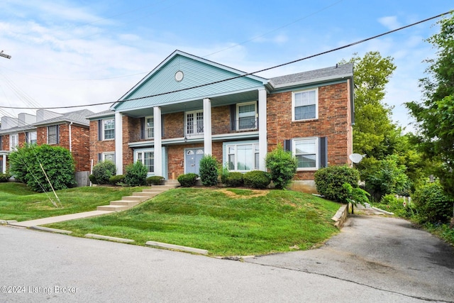 view of front of property with a front lawn