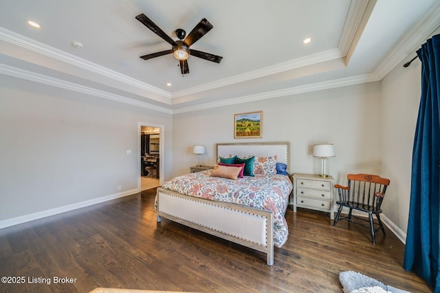 bedroom featuring ceiling fan, a raised ceiling, ornamental molding, and dark wood-type flooring