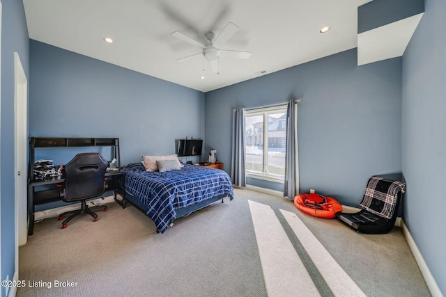 carpeted bedroom with ceiling fan