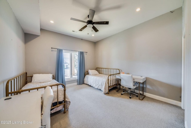 bedroom with ceiling fan and carpet floors