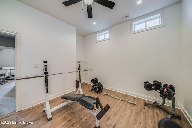 workout area featuring wood-type flooring