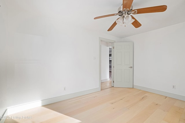 empty room featuring hardwood / wood-style flooring