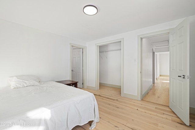 bedroom with light hardwood / wood-style flooring