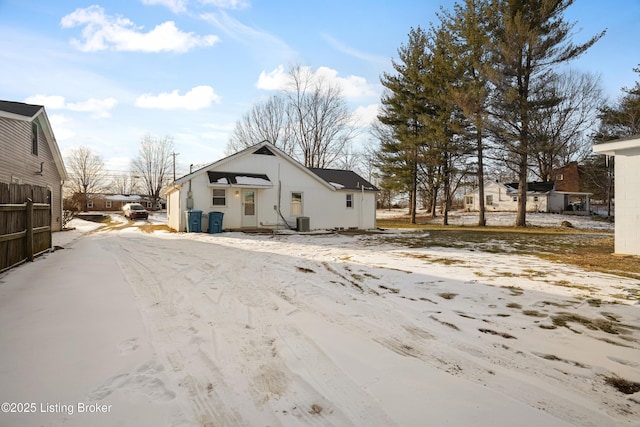 view of property exterior with central AC