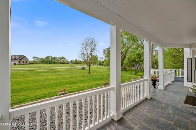 view of patio featuring a porch