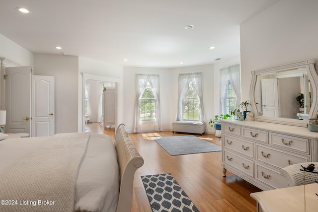 bedroom with light hardwood / wood-style floors