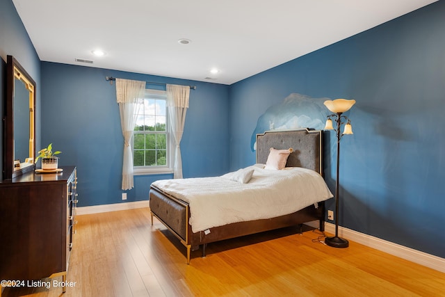 bedroom featuring light wood-type flooring