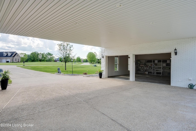 view of patio featuring a garage