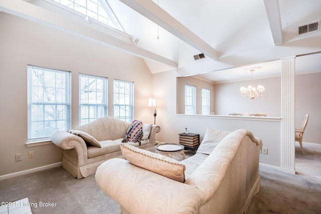 living room with a towering ceiling, beam ceiling, a chandelier, and carpet flooring