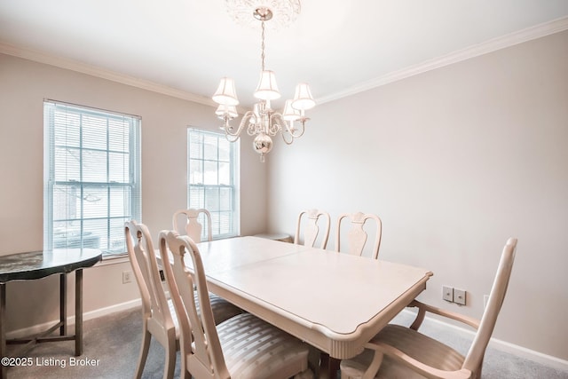 carpeted dining space with crown molding, an inviting chandelier, and a healthy amount of sunlight