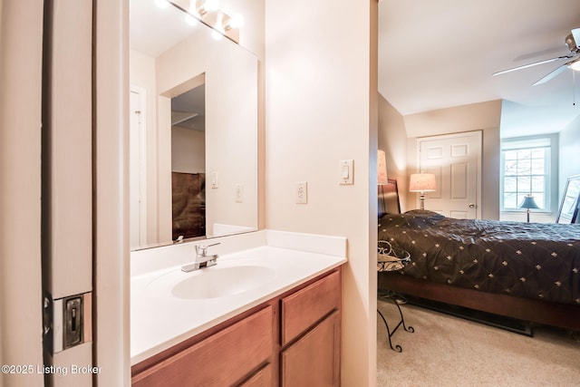 bathroom featuring ceiling fan and vanity