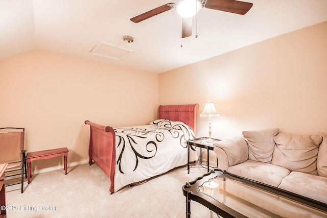 bedroom featuring ceiling fan, light colored carpet, and lofted ceiling