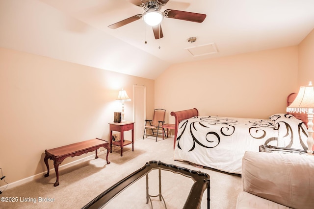 carpeted bedroom with vaulted ceiling and ceiling fan