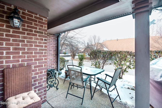 view of snow covered patio