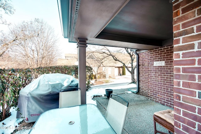 view of patio featuring a grill