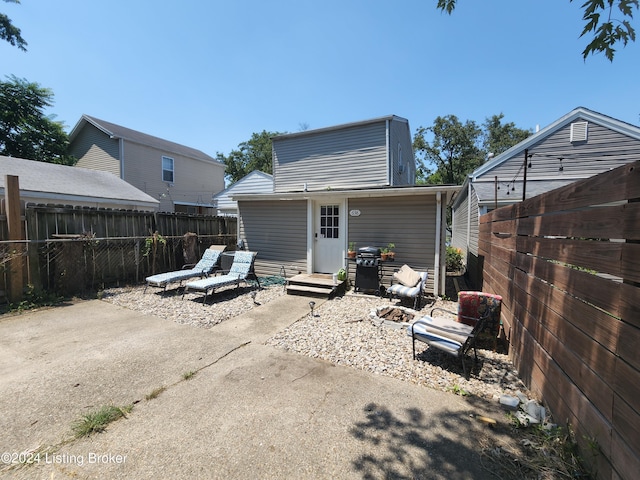 rear view of house featuring a patio