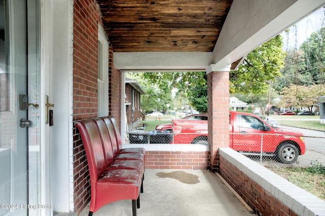 view of patio featuring a porch