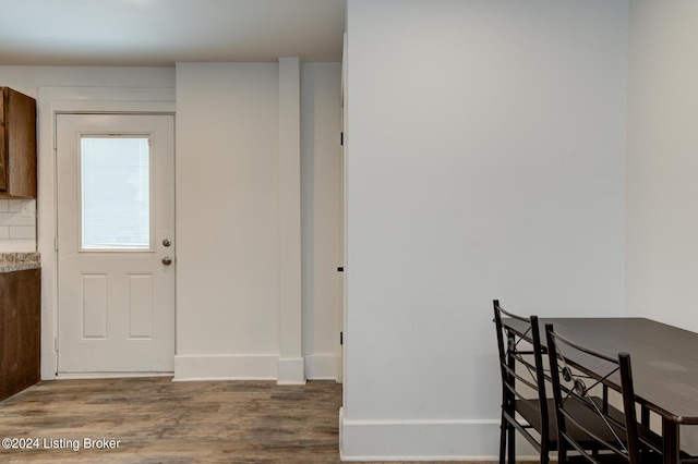 dining space featuring hardwood / wood-style floors