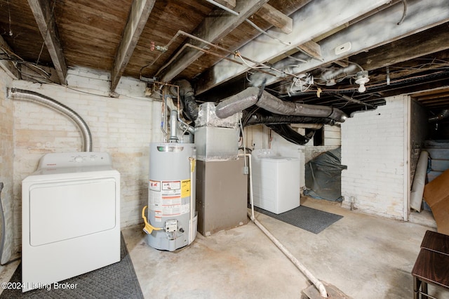 basement with heating unit, brick wall, and gas water heater