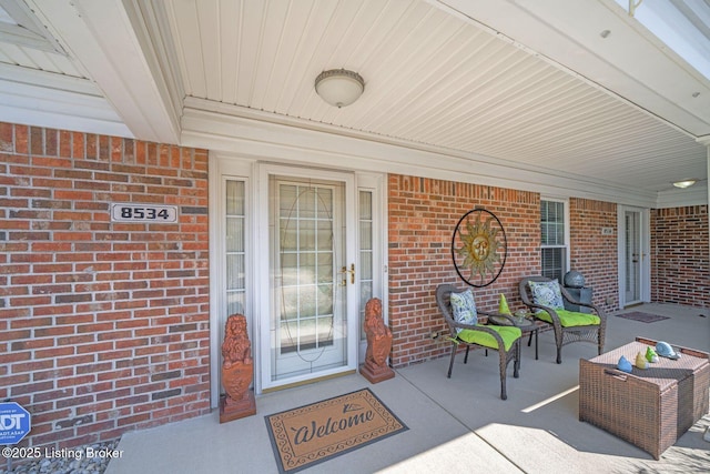 entrance to property with covered porch