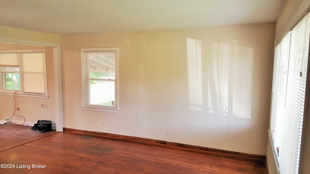 empty room featuring hardwood / wood-style flooring