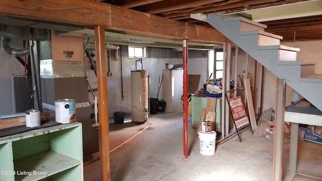 basement featuring gas water heater