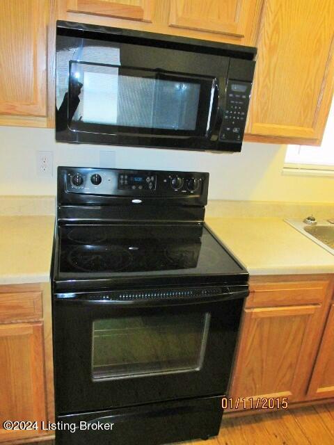 kitchen with black appliances