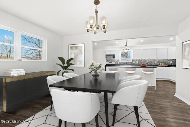 173 Kentucky Cir, Radcliff, KY 40160 - dining space with recessed lighting, a notable chandelier, and dark wood-style floors