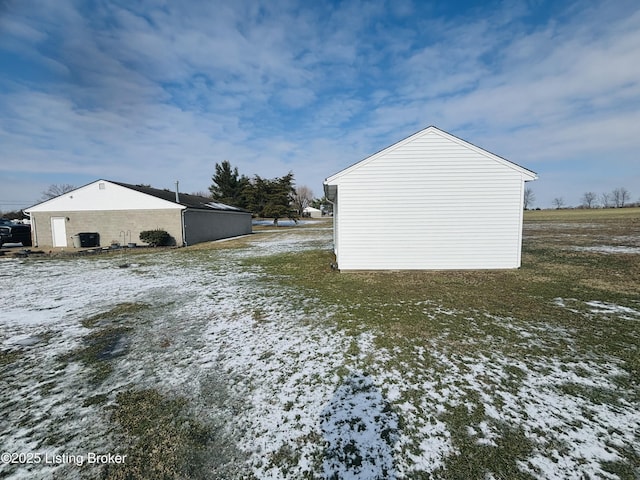 view of yard covered in snow