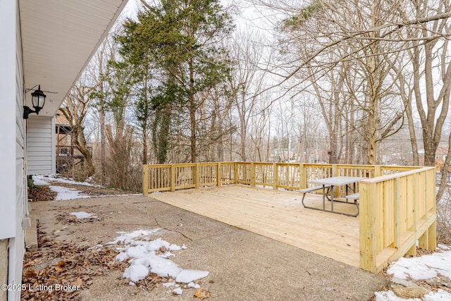 view of snow covered deck