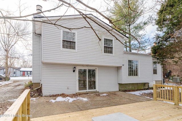 rear view of property with a deck