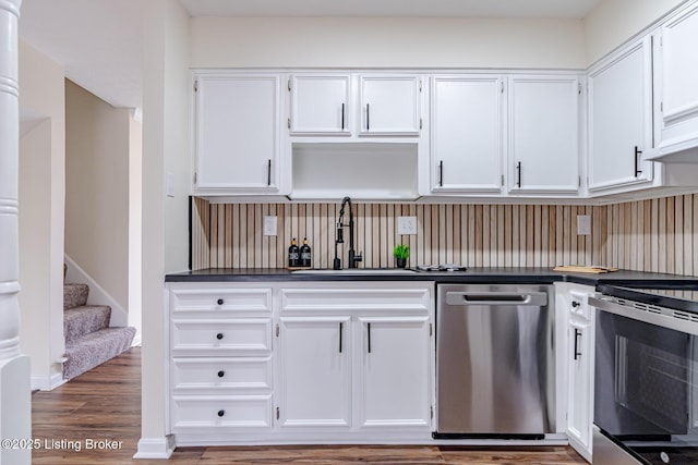 kitchen with sink, white cabinetry, and appliances with stainless steel finishes