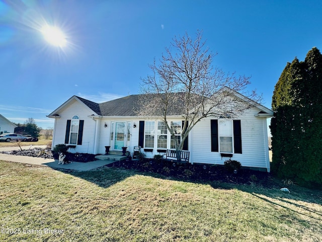 single story home with a front lawn