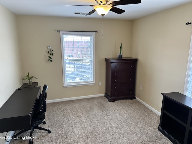 office space with ceiling fan and light colored carpet