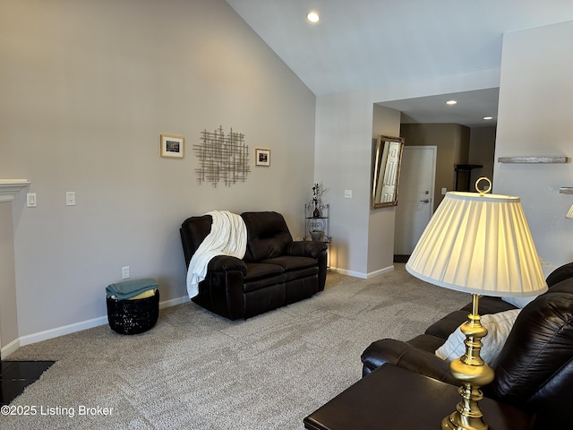 living room featuring light colored carpet and lofted ceiling