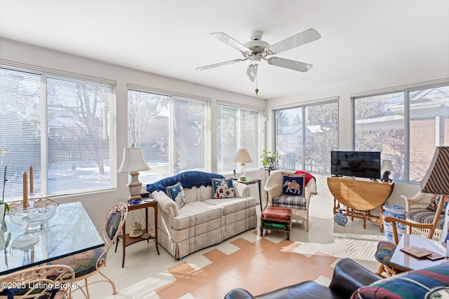 sunroom / solarium with ceiling fan