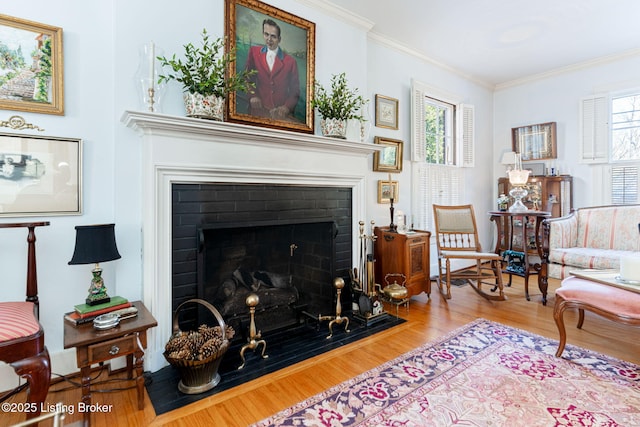 living room featuring crown molding and wood-type flooring