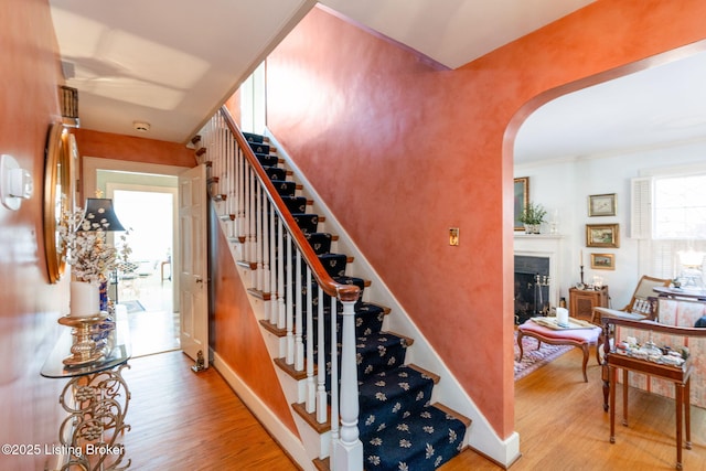 stairs with wood-type flooring