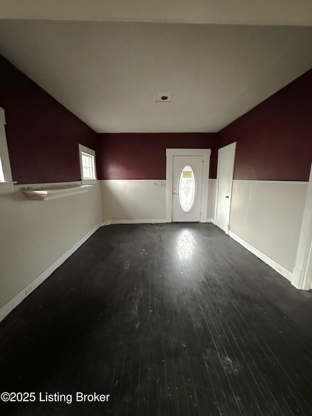 entrance foyer with dark hardwood / wood-style flooring